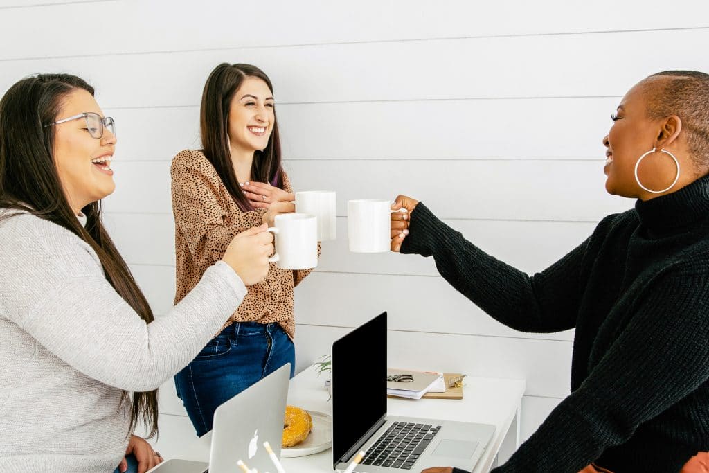 virtual assistant friends in circle with coffee