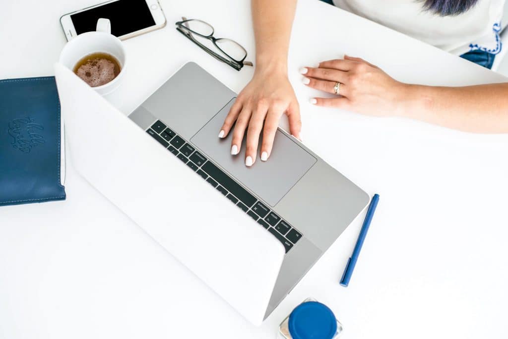 freelancer working on business budget with laptop