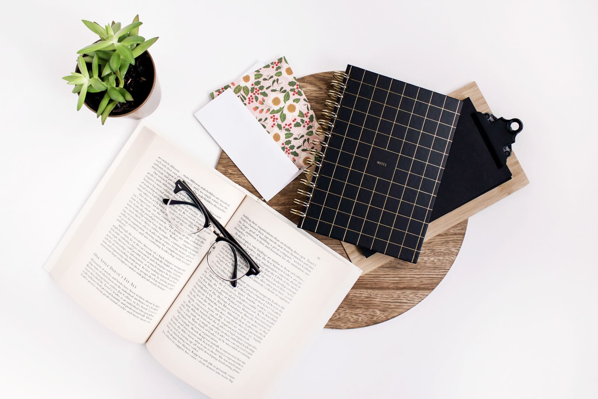 Book and notebook on desk