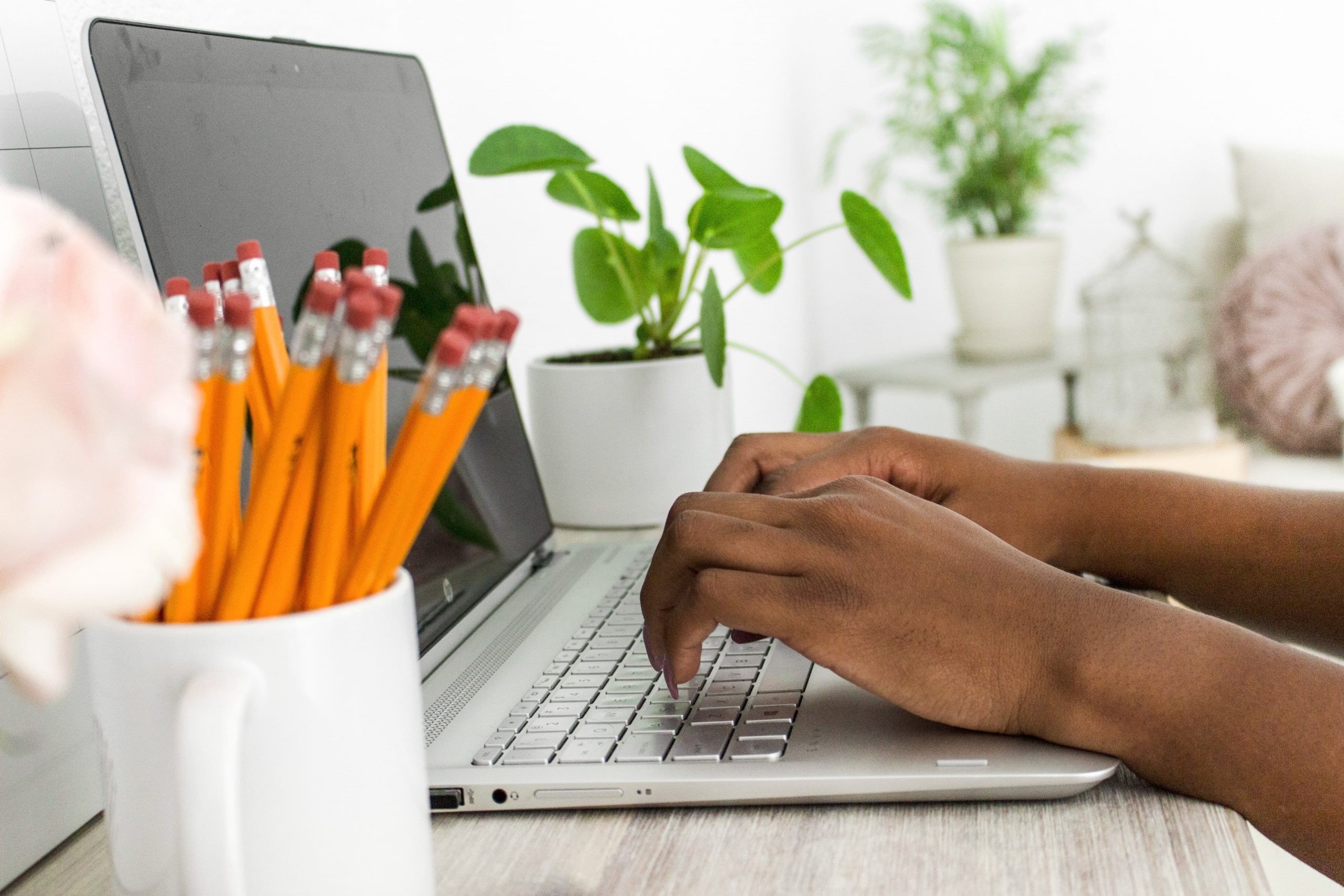 Woman typing on laptop