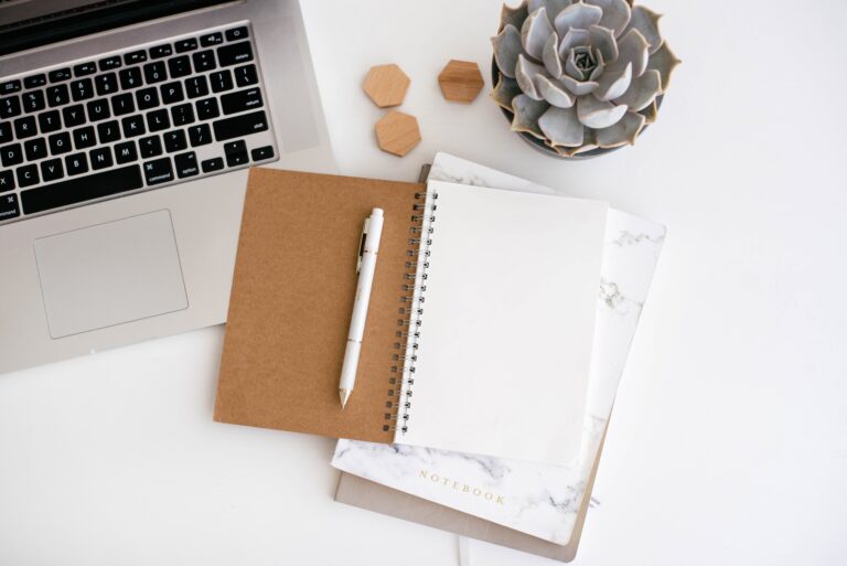 Notebook placed on a computer table.