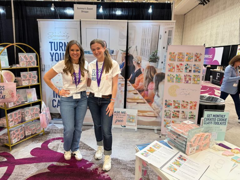 chynna and summer smiling at the camera at a cookiecon tradeshow